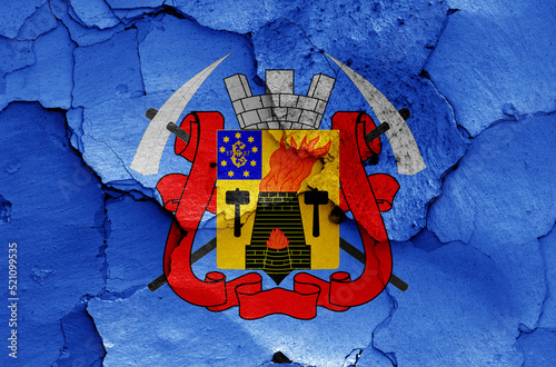 flag of Luhansk painted on cracked wall