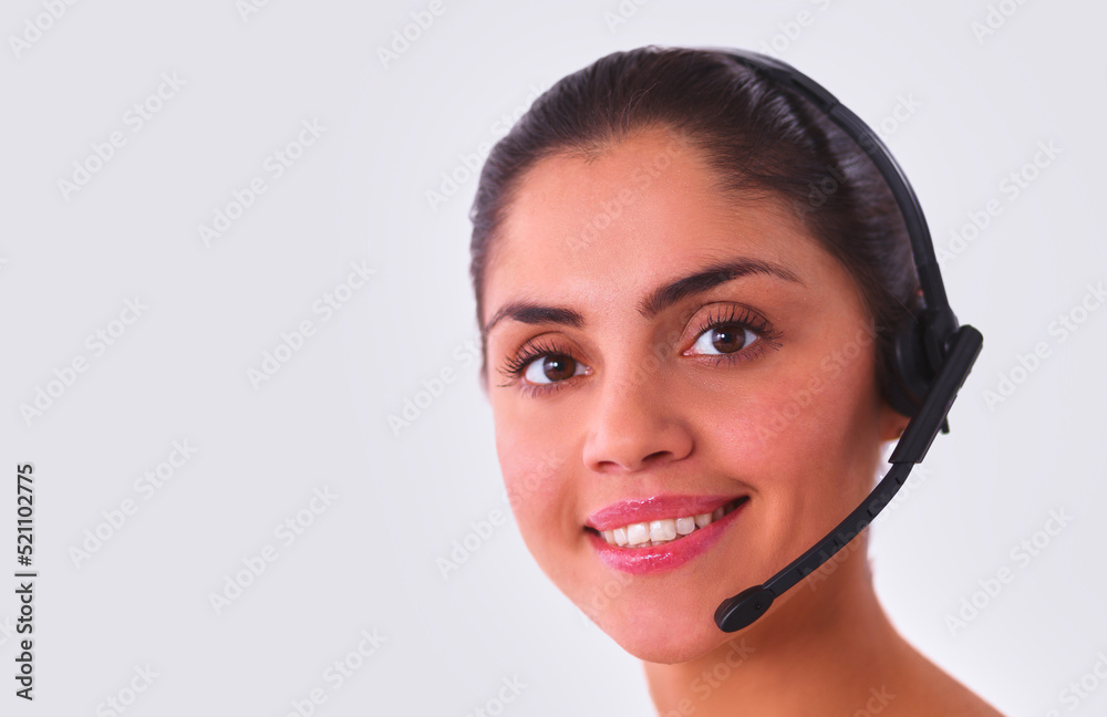 Close-up portrait of a customer service agent sitting at office Close-up portrait of a customer service agent sitting at office