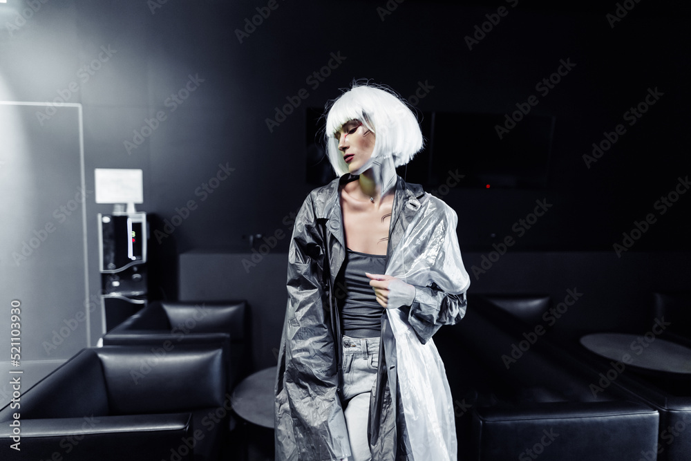 Fashionable blonde in a raincoat. Fashionable blonde in a raincoat.