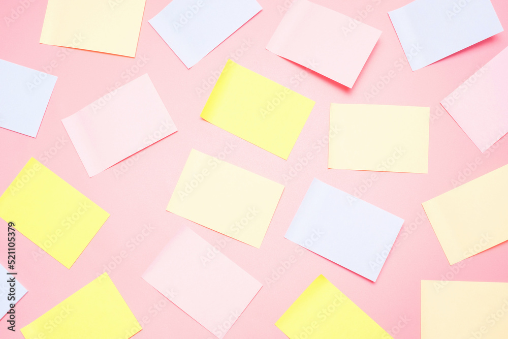 Mock-up of many empty multicolored office stickers on a pink background. Mock-up of many empty multicolored office stickers on a pink background.
