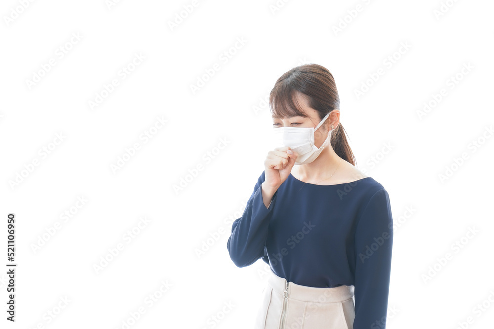 Young woman wearing a mask having symptoms of cough Young woman wearing a mask having symptoms of cough