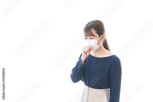 Young woman wearing a mask having symptoms of cough