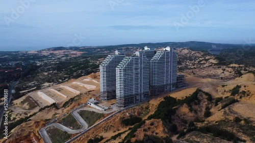 Apec Mandala Wyndham Mui Ne On Sand Dunes, Holiday Apartment Buildings In Phan Thiet, Vietnam. - aerial photo