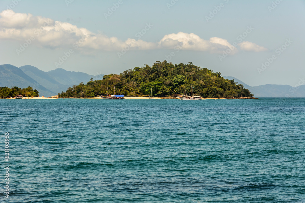 Tropical island in the sea at Angra dos Reis town, State of Rio de Janeiro, Brazil. Taken withNikon D7100 18-200 lens, at 75mm, 1/100 f 10 ISO 100. Date: Dec 23, 2014