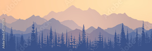 Sunrise in the mountains, ridge in the morning haze, panoramic view