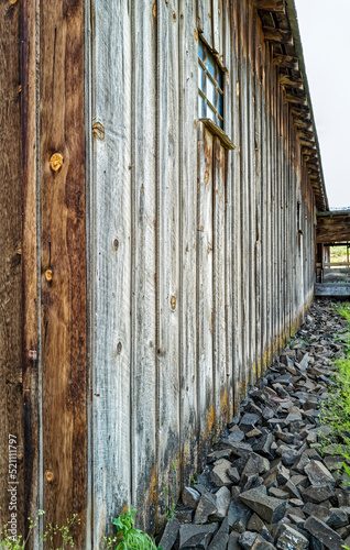 Perspective view of the side of an abandoned barn in central Oregon  USA