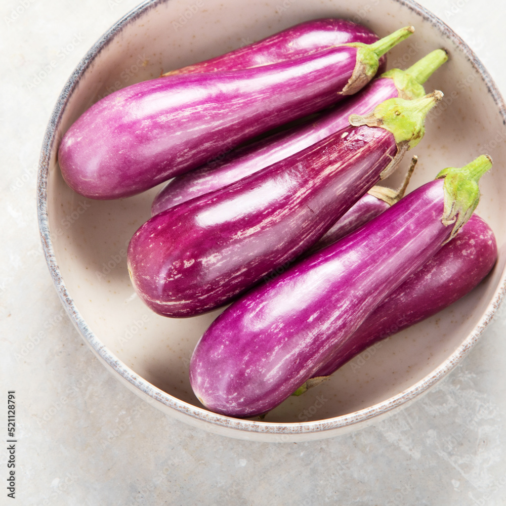 Fresh aubergine eggplant on neutral background. Fresh aubergine eggplant on neutral background.