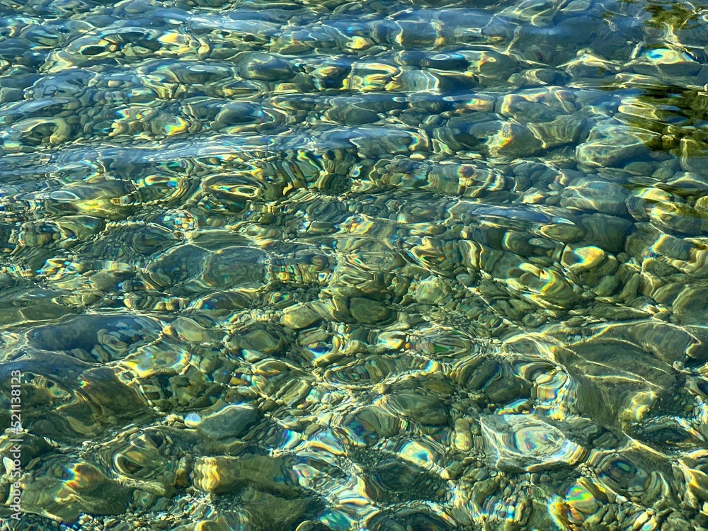 Pebbles stones in transparent sea water. Stock Photo | Adobe Stock