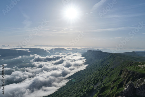 Sierra de Andia (Mount Beriain) in the early morning with a sea of ​​clouds covering the valley, Sierra de Andia, Navarra, Spain