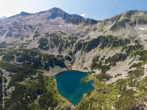 Aerial view of a lake in the Pirin mountains with blue clear water. Bansko, Bulgaria. photo