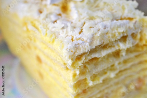 close up, detail of layers slice of white chocolate and vanilla cake