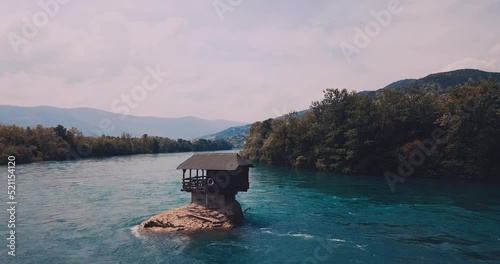 A house on a rock on the Drina River in Serbia photo