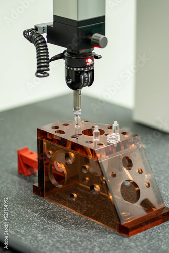 Close up automatic coordinate measurement machine (CMM) for inspection of high precision part during working