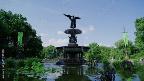 Fountain with Angel of the Waters statue. Bethesda Terrace. Lake in New York City's Central Park. USA. Summer, daytime. High quality 4k footage