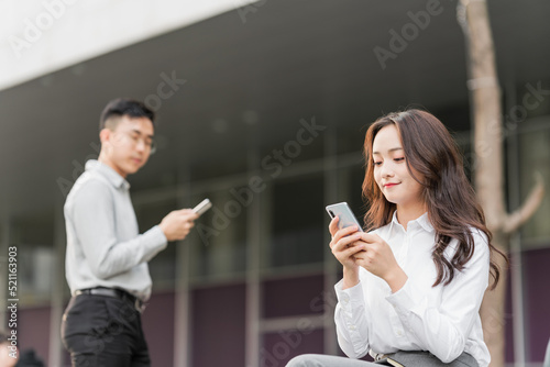 Asian business men and women working partners outdoors