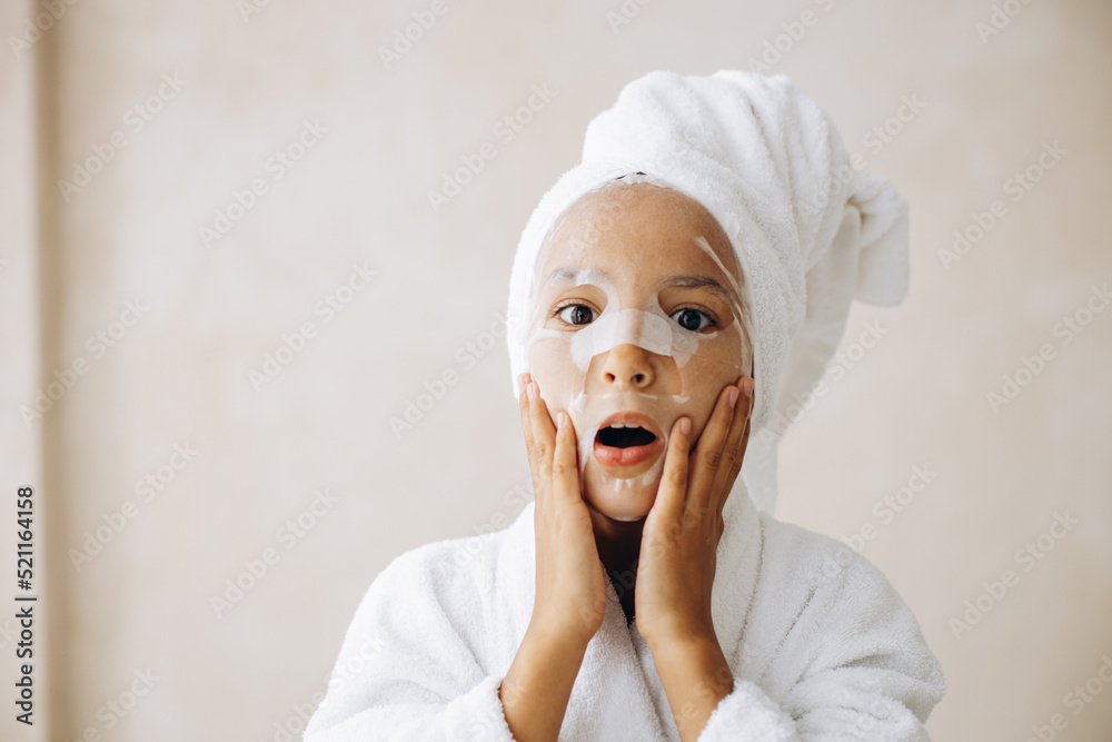 Cute preteen girl puts on patch moiszturizing mask Cute preteen girl puts on patch moiszturizing mask