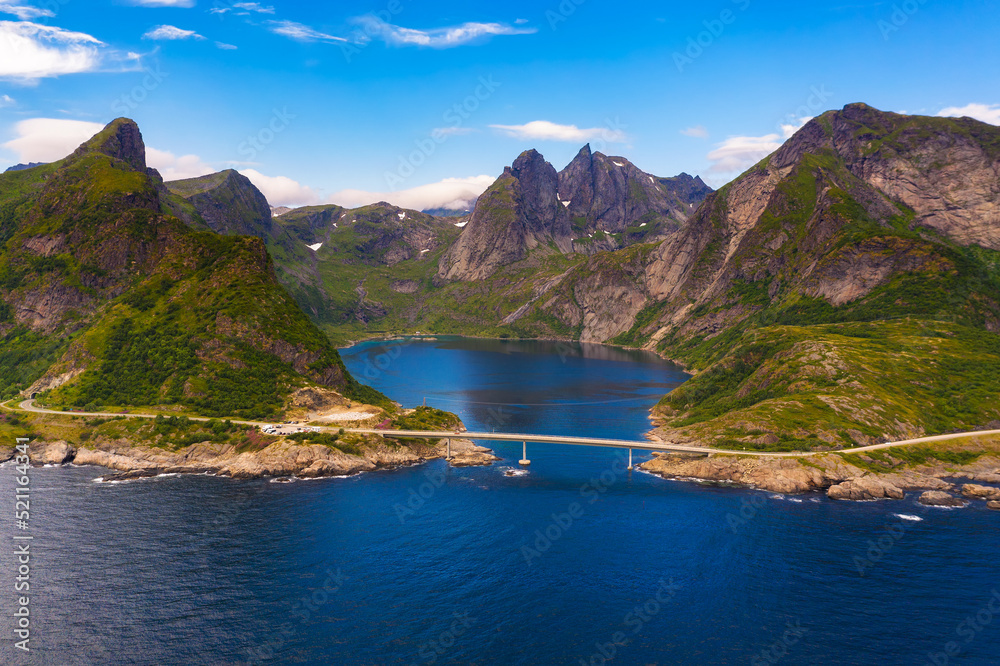 Aerial view of Djupfjorden fjord surrounded by high mountains in Lofoten, Norway