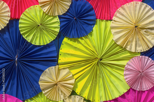 circle shape of colorful papers for Background texture. Colorful paper background. Recycled paper folding umbrella, © nutta