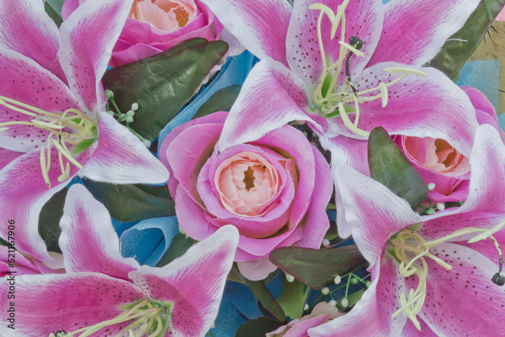 Obraz premium Close up view of a beautiful bouquet of mixed coloful flowers . The concept of a flower shop and flower delivery as a family business, florist work.