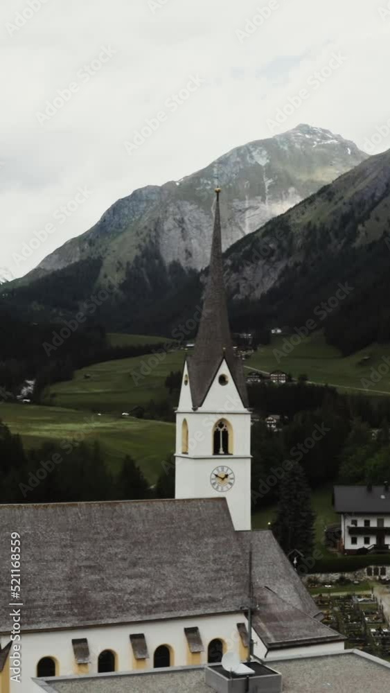 Panoramic view of a picturesque mountain valley with a village in a lowland Panoramic view of a picturesque mountain valley with a village in a lowland