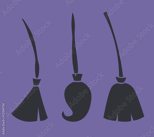 Set of witch brooms. Halloween attribute in black flat style.