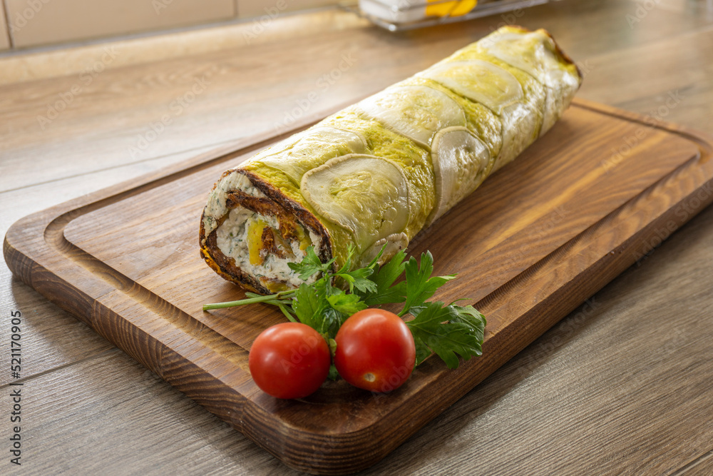 roll of fresh zucchini and egg. food concept. roll of fresh zucchini and egg. food concept.