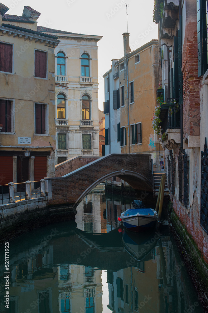 narrow street and canal of Venice