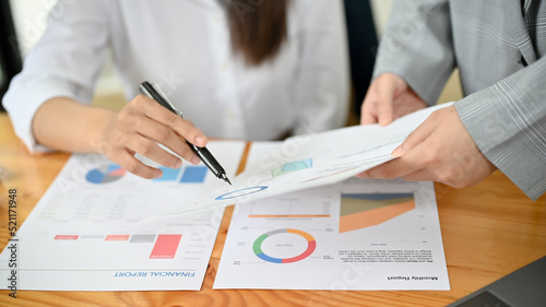 Cropped image, A financial team reviewing the financial data report together.