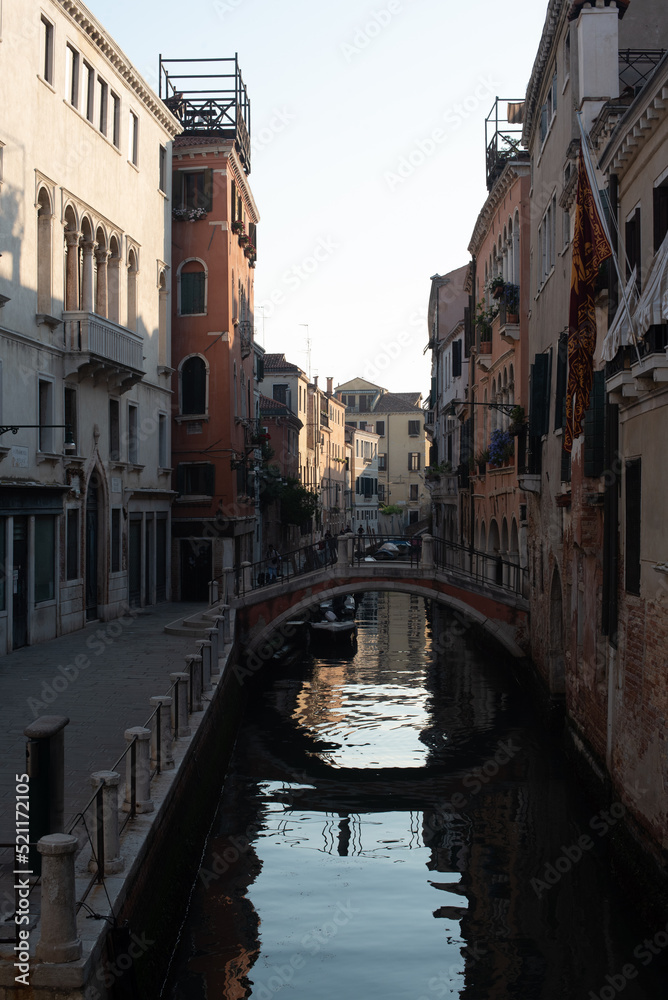 narrow street and canal of Venice