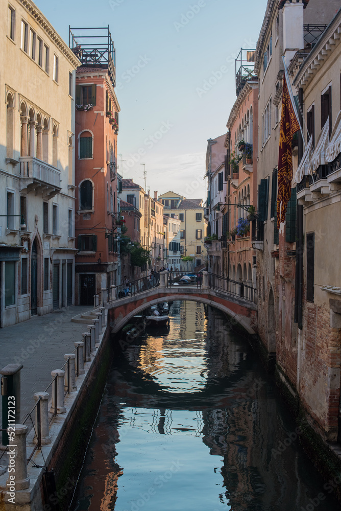 narrow street and canal of Venice