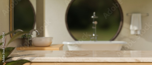 Modern marble bathroom tabletop with empty space over blurred minimal bathroom with bathtub