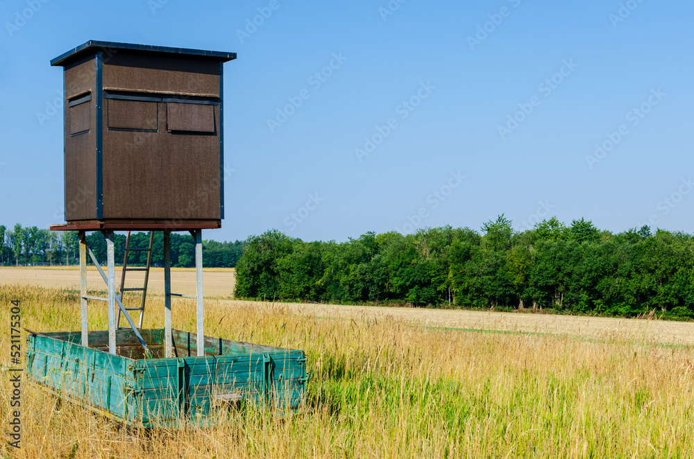 Animal watching tower on the field.