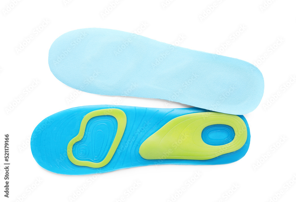 Light blue orthopedic insoles isolated on white, top view Light blue orthopedic insoles isolated on white, top view