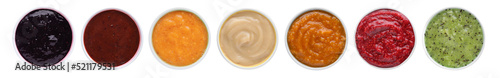 Foto Set with different tasty fruit puree on white background, top view
