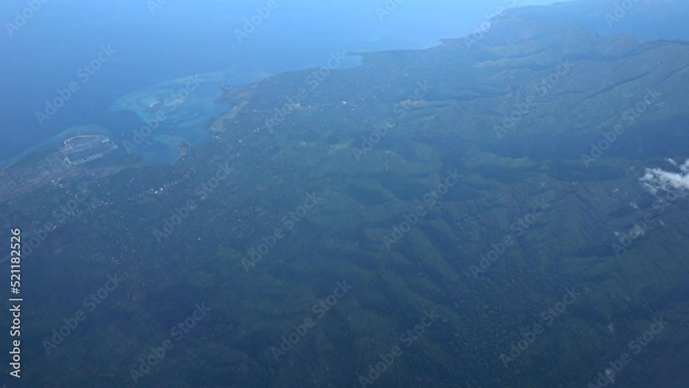 View of Pemuteran and the mountains close by from airplane View of Pemuteran and the mountains close by from airplane