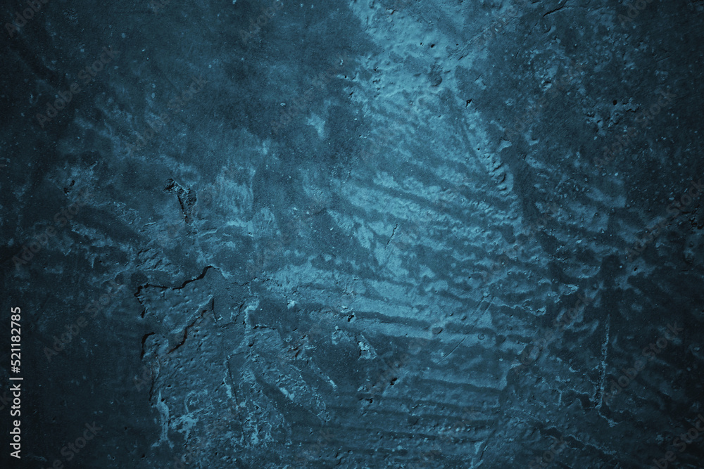 Abstract grunge blue stucco wall background. Dark stone wall concept background with space for text.