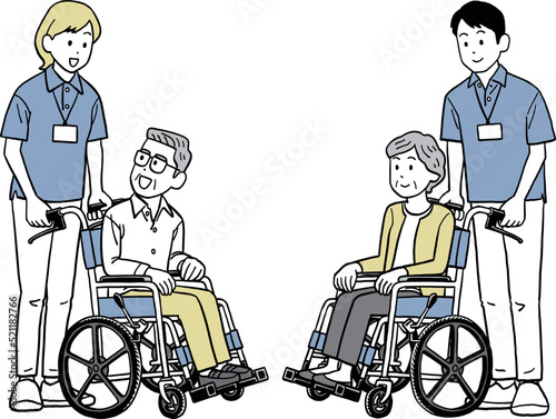 車椅子に乗るお年寄りと介護士