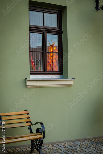 Reflection of holiday lights in the window