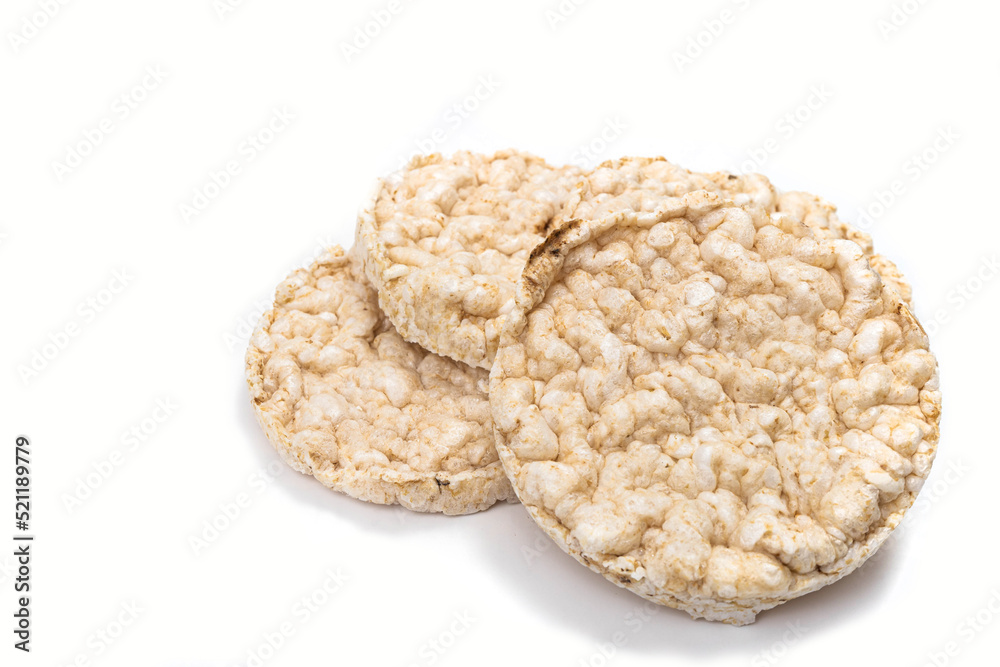 Exquisite round rice crackers on a white surface. Copy Space. Healthy eating. Exquisite round rice crackers on a white surface. Copy Space. Healthy eating.