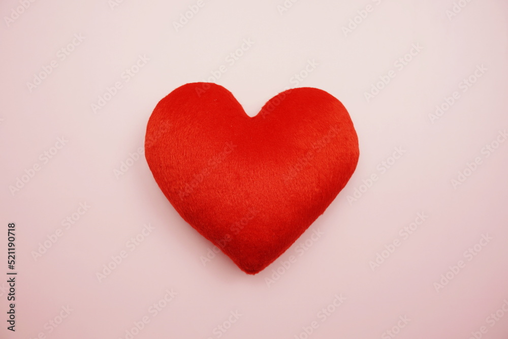 Top view Red Heart on pink background