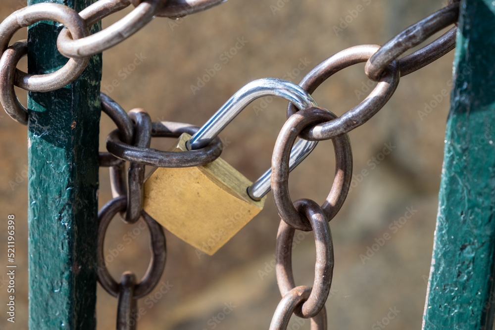 A double iron door chained closed A double iron door chained closed