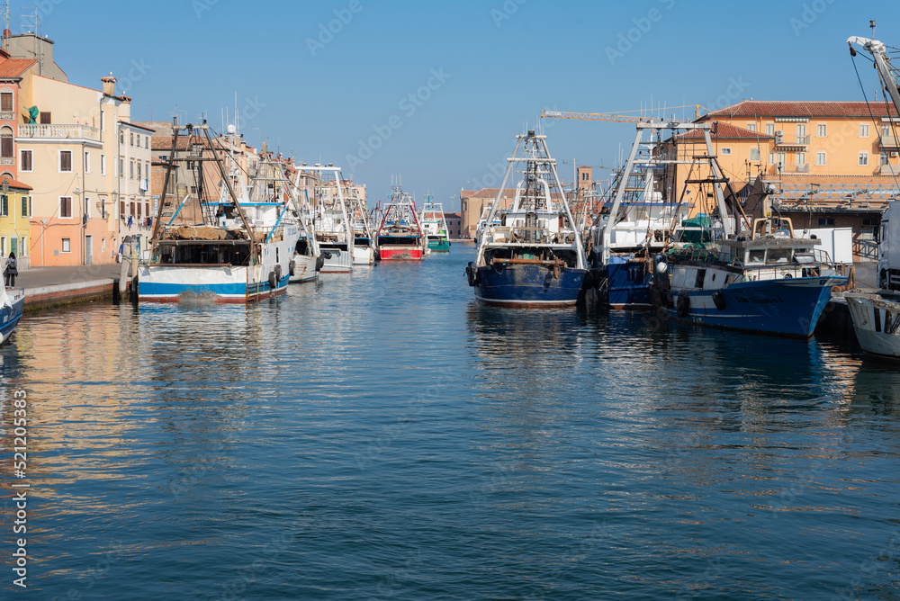 The fishing boats wait to set sail towards the sea of Chioggia,Veneto,italy