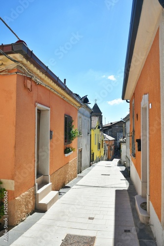 Fototapeta Naklejka Na Ścianę i Meble -  A small street between the old houses of Savignano Irpino, one of the most beautiful villages in Italy.