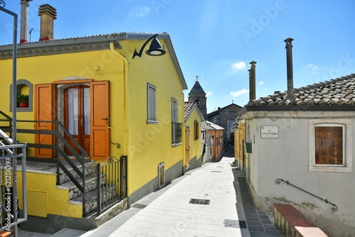 Fototapeta Naklejka Na Ścianę i Meble -  A small street between the old houses of Savignano Irpino, one of the most beautiful villages in Italy.