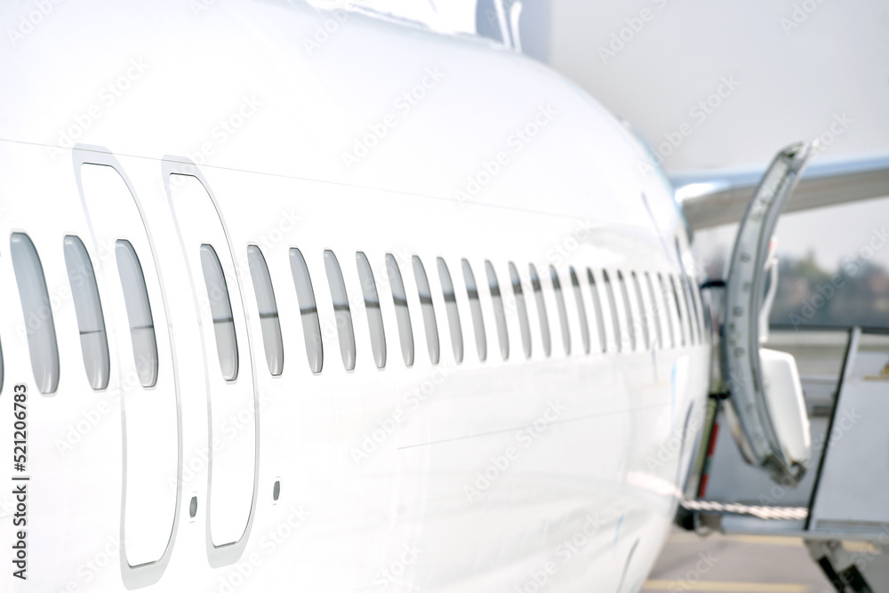 Exterior of a modern airplane and no passangers in the airplane. Empty airplane. Exterior of a modern airplane and no passangers in the airplane. Empty airplane.