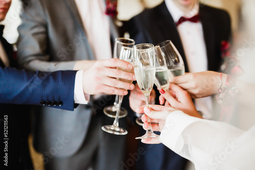 Gorgeous wedding couple enjoys champagne in the ceremony