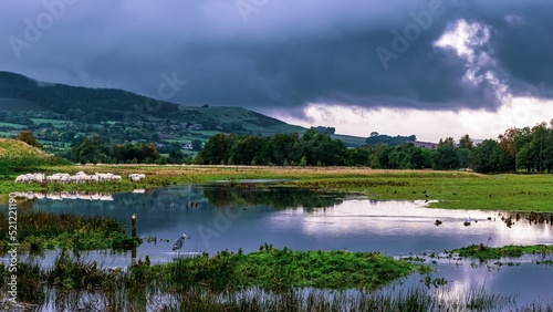 Landscape of Rothbury with stormy skies photo