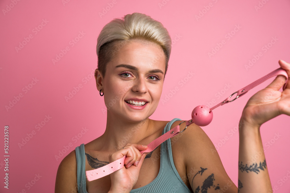 Woman Posing With Pink Silicone Ball Gag For Her Mouth With Breathing Woman Posing With Pink Silicone Ball Gag For Her Mouth With Breathing