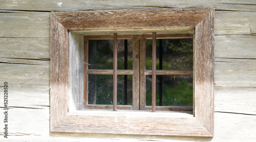 Wooden window in a rustic home Wooden window in a rustic home