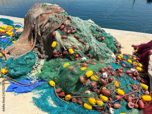 Closeup of fishing nets on a port photo